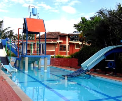 https://imgcld.yatra.com/ytimages/image/upload/t_hotel_yatra_city_desktop/v1480333161/Domestic Hotels/Hotels_Coorg/Coorg Jungle Kids Boutique Resort/JKM_-_POOL.jpg